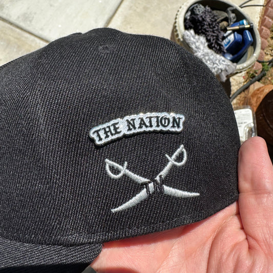 The Nation enamel pin